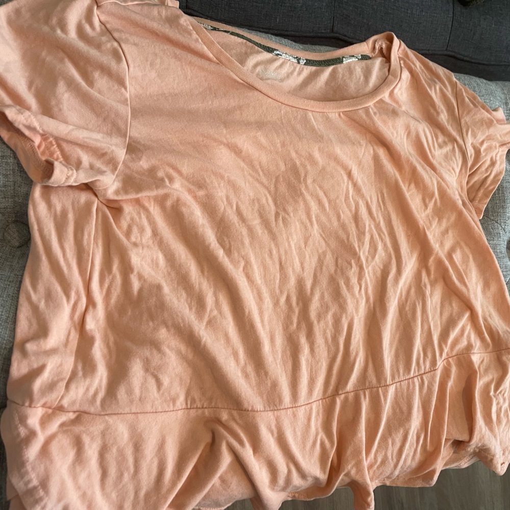 Light, flowy, salmon pink colored top, size large.